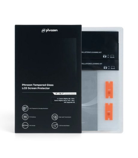 Phrozen tempered glass LCD screen protector box standing beside its unpacked contents, including the safety booklet, orange scraper tools, and cleaning kits.