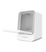 Phrozen Air Purifier Max with the front door open at an angle, revealing the empty internal filter chamber and pull out tray.