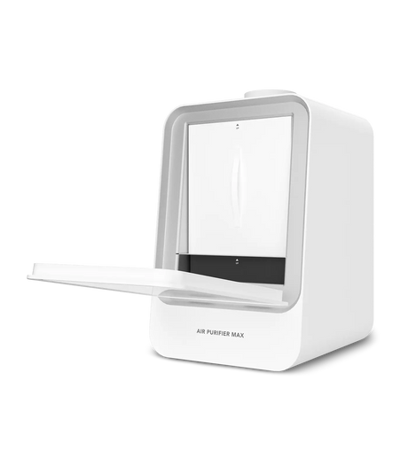 Phrozen Air Purifier Max with the door open, showing the internal filter compartment and slide out tray with the carbon filter panel visible.