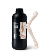 Bottle of Phrozen BJD Soft Light Blush Ivory 3D printer resin, 1kg, beside a printed ball jointed doll arm and hand.