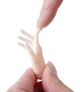 Ball jointed doll hand printed in Phrozen BJD Soft Light Blush Ivory resin, held between two fingers to show the resin's flexibility and softness