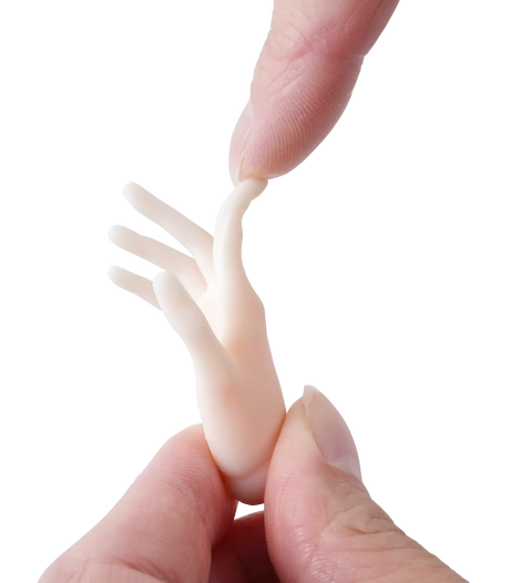 Ball jointed doll hand printed in Phrozen BJD Soft Light Blush Ivory resin, held between two fingers to show the resin's flexibility and softness