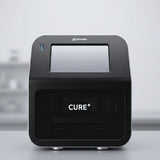 Phrozen Cure+ dental resin curing unit, front view, showing the touchscreen display and curing chamber.