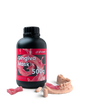 Phrozen Gingiva Mask resin bottle beside a printed gingiva sample, implant post, and partial arch model