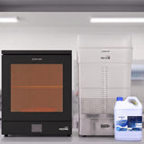 Phrozen Cure Mega S and Wash Mega S bundle with 4x Resinaway 5L cleaning solution on light grey workshop shelf