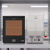 Phrozen Cure Mega S curing station and Wash Mega S wash station bundle on light grey workshop shelf
