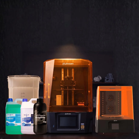 Phrozen Sonic Mighty Revo 16K resin 3D printer super bundle with wash and cure kit, Aqua Hyperfine Graphite resin, Resinaway and RinseOff on dark hardwood bench in professional maker studio