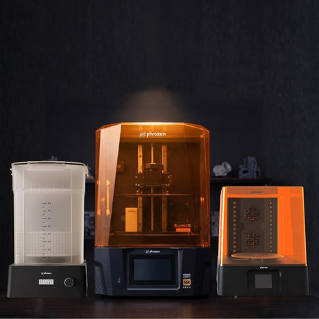 Phrozen Sonic Mighty Revo 16K resin 3D printer with wash and cure kit on dark hardwood bench in professional maker studio