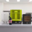 Phrozen Sonic Mega 8KS resin 3D printer awesome bundle with Wash Mega S, Cure Mega S, Aqua-Gray 8K resin and Resinaway on commercial studio desk