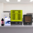 Phrozen Sonic Mega 8KS resin 3D printer bundle C with Wash Mega S, Cure Mega S and Aqua-Gray 8K resin on commercial studio desk