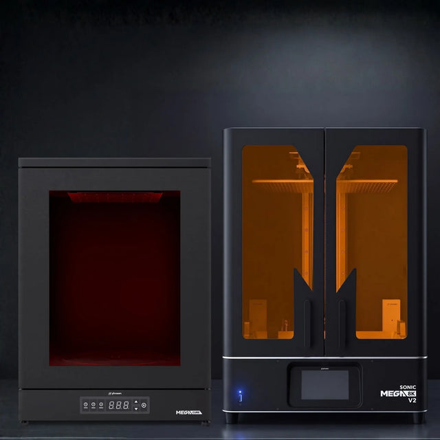 Phrozen Sonic Mega 8K V2 industrial resin 3D printer with Cure Mega UV curing station on dark steel surface in production environment
