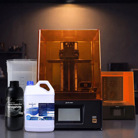 Phrozen Sonic Mighty 12K resin 3D printer everything starter kit with wash station, cure station, Aqua Hyperfine Graphite resin and Resinaway on dark studio desk