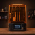 Phrozen Sonic Mighty Revo 14K resin 3D printer front view on warm timber workbench