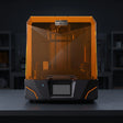 Phrozen Sonic Mighty Revo 16K MAX resin 3D printer front view on dark studio workbench