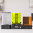 Phrozen Sonic Mini 8KS resin 3D printer with wash station and cure station on white home office desk