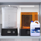 Phrozen wash and cure kit with Monocure3D Resinaway on light grey workshop shelf